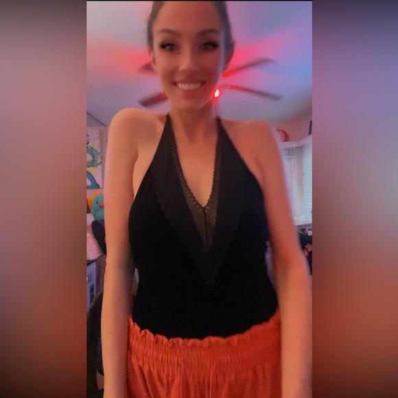 Elegant Black Top with Flowing Coral Pants - Picture 15 of 17